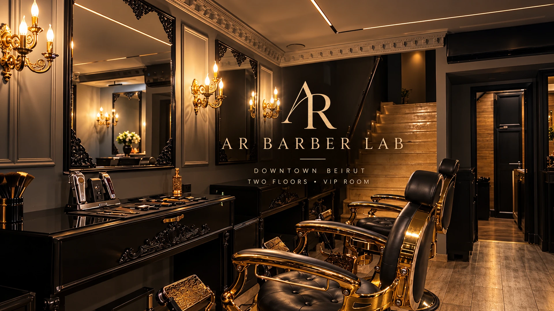 Inside AR Barber Lab: black and gold barber chairs, mirrors and wall sconces, with the AR Barber Lab lettering